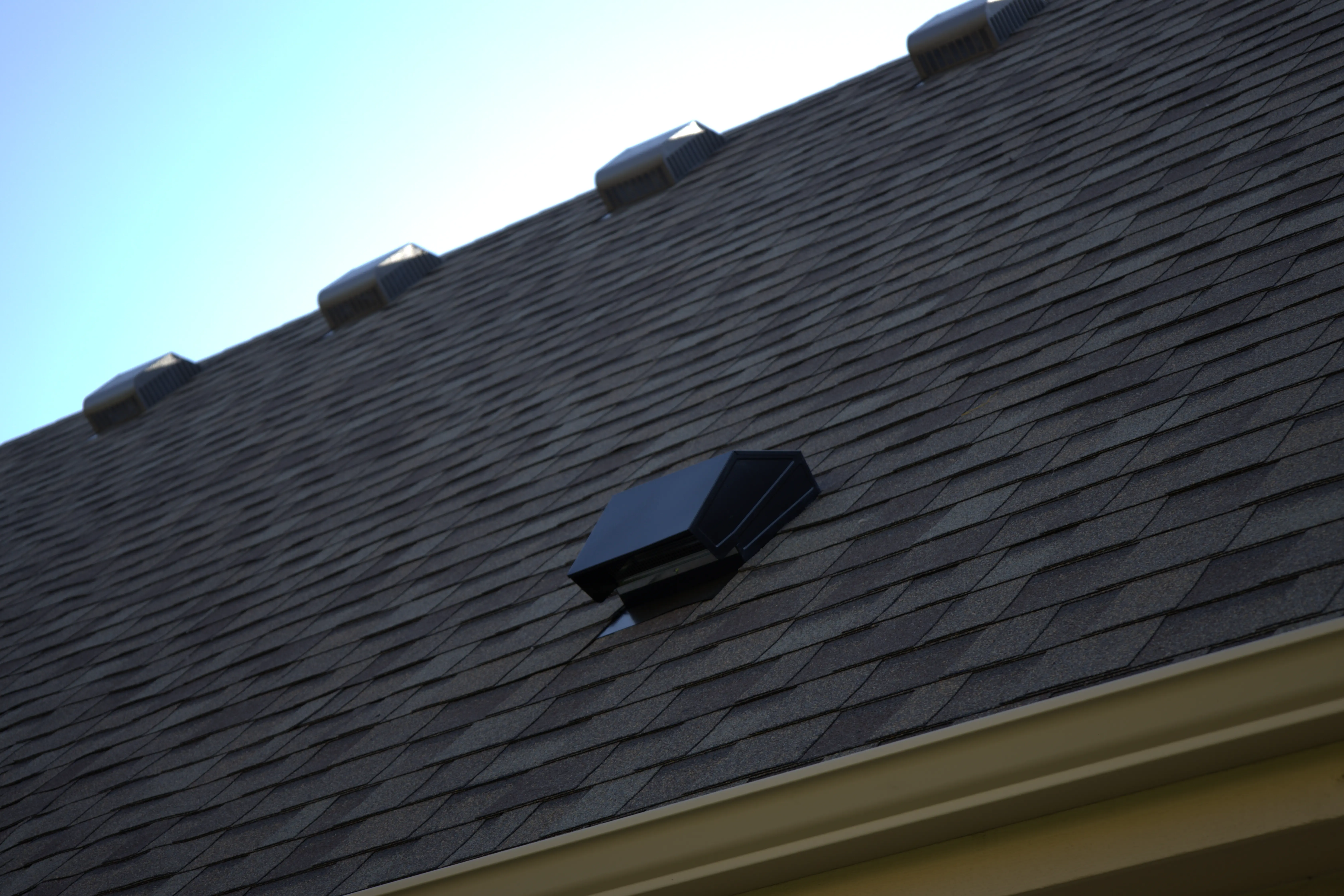 Vent Sticking Out Of Residential Roof