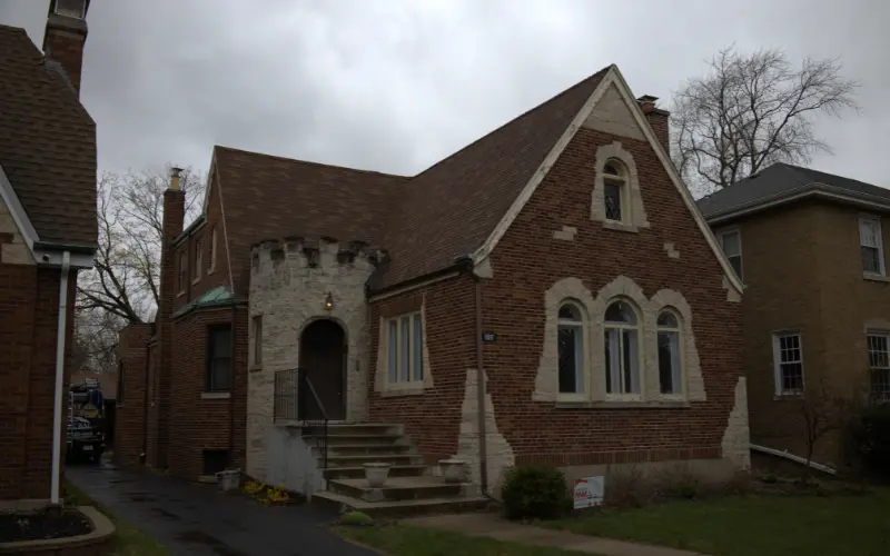 Pre Roof Replacement Residential Home With Castle Stone Entrance