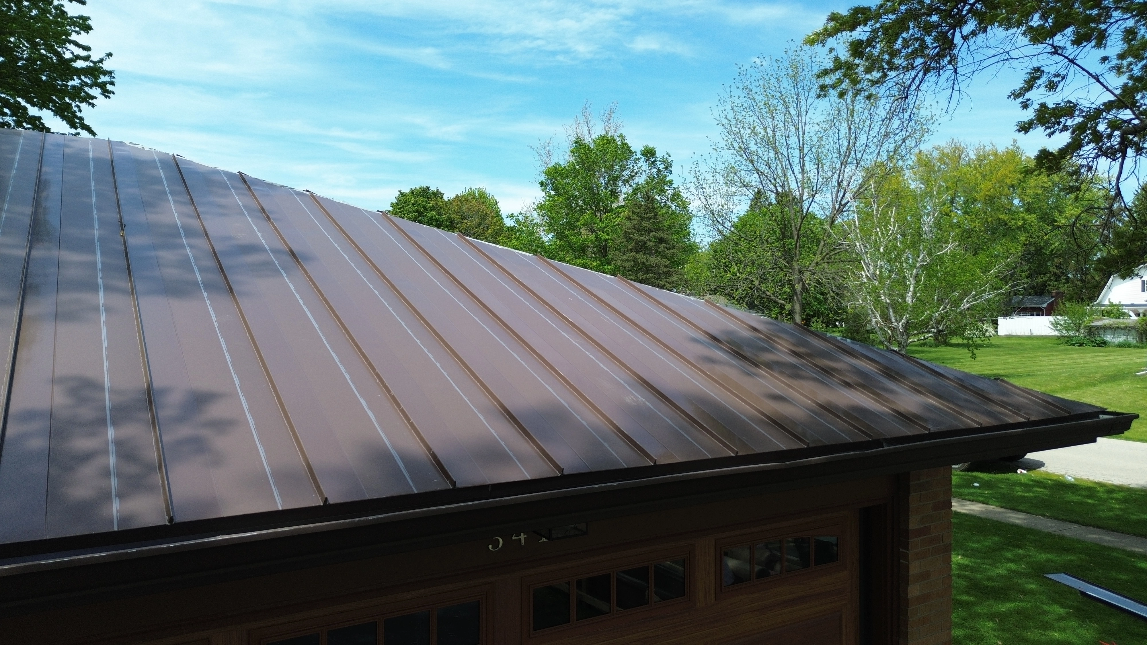 Brown Metal Roofing Installed By Global Exter
