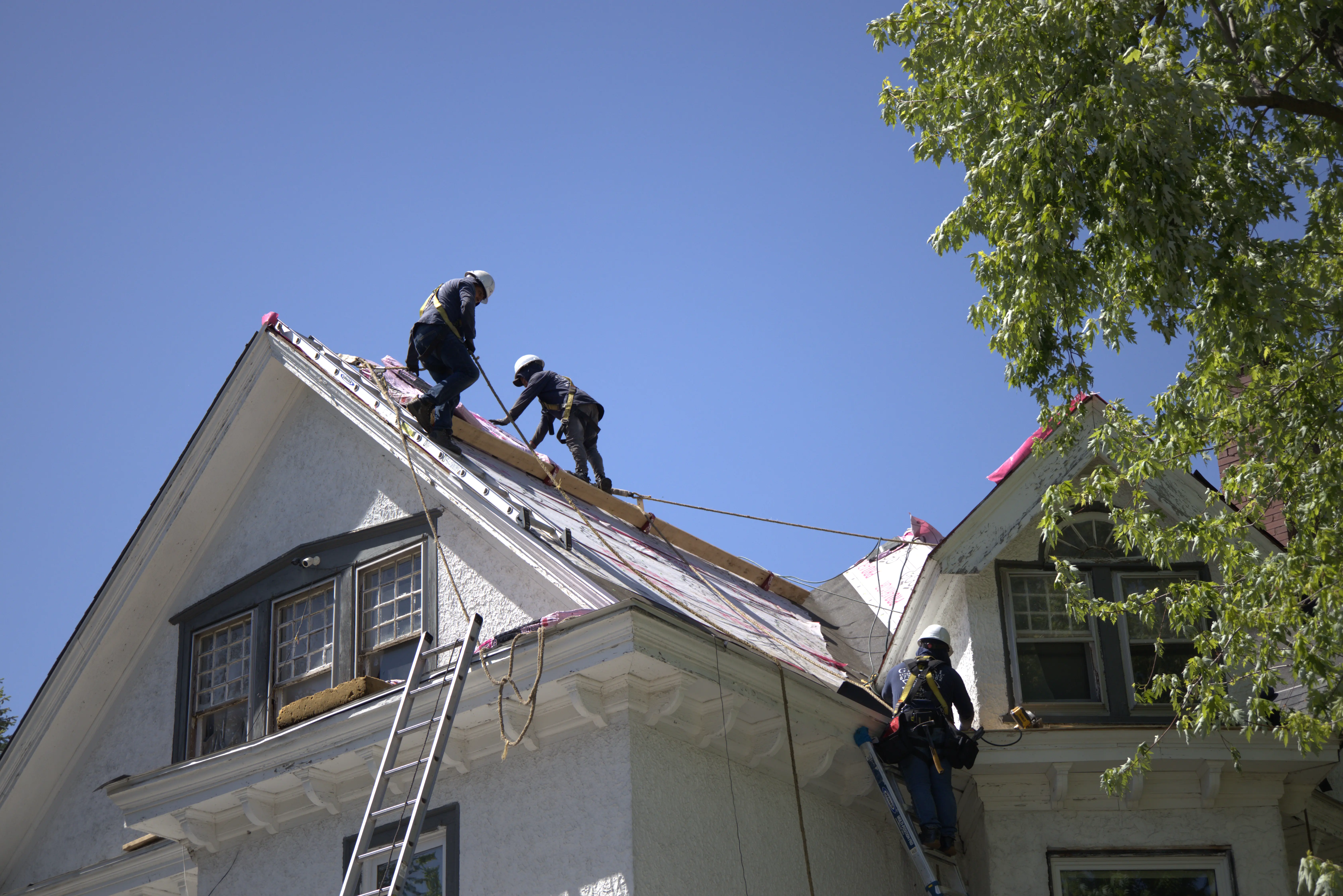 Roofers Replacing A Roof