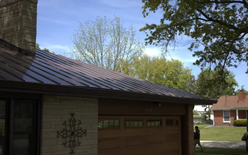 New Brown Metal Roof Installed On Residential Home