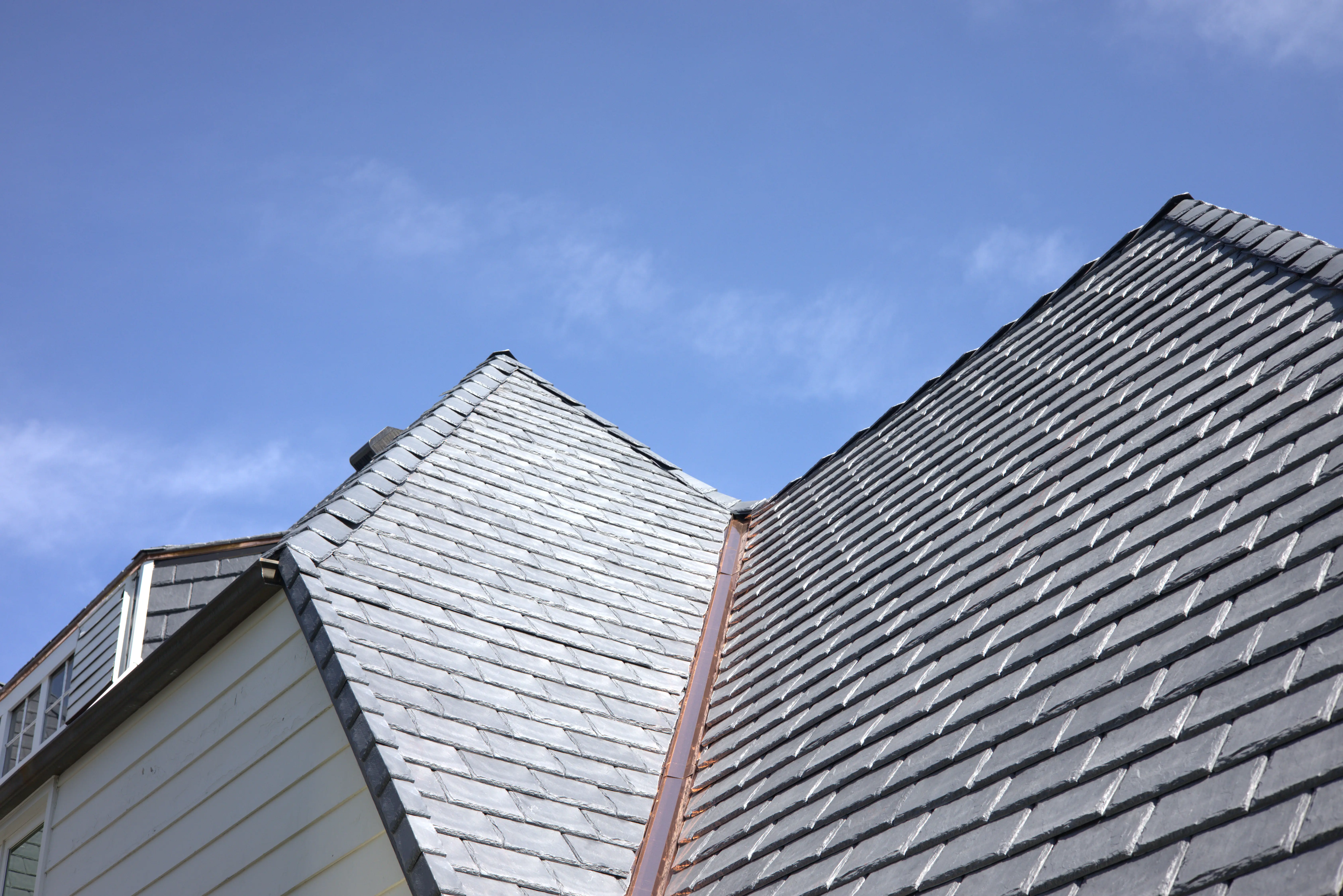 Drip edge flashing on residential slate roof home