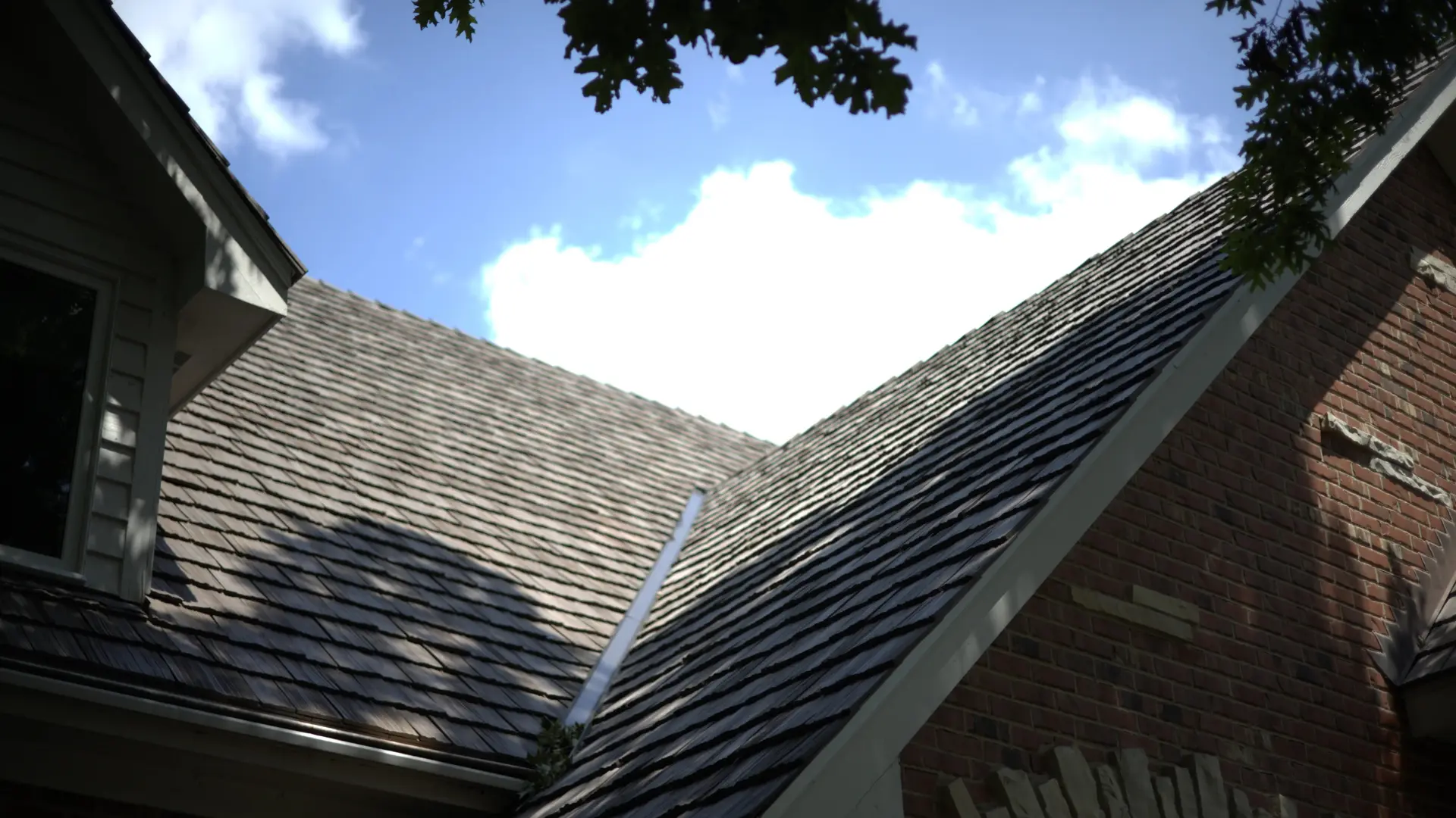 Valley On Residential Roof With Brown Synthetic Shake