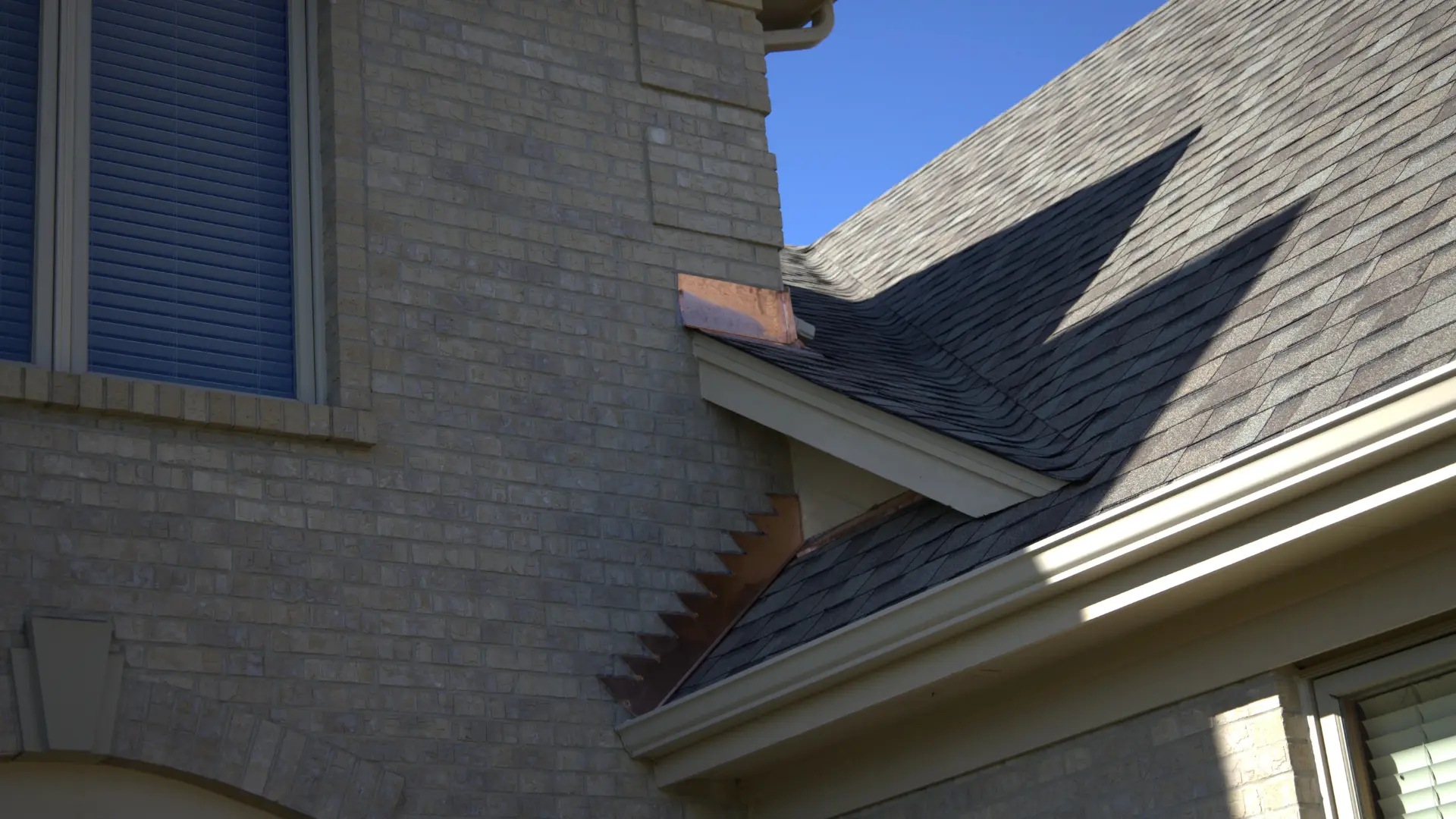 Copper Step Flashing On New Residential Roof Replacement Project Done By Expert Roofers