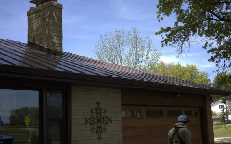 Brown Standing Seem Metal Roof On A Residential Roof