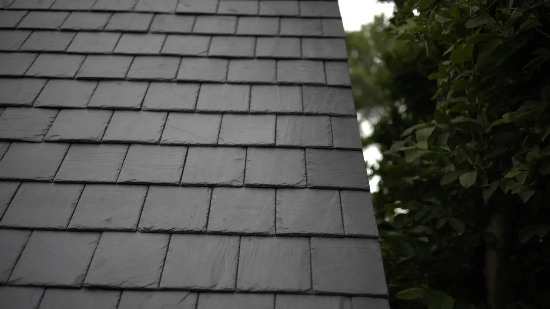 Grey Natural Slate Roof Installed On A Residential Roof