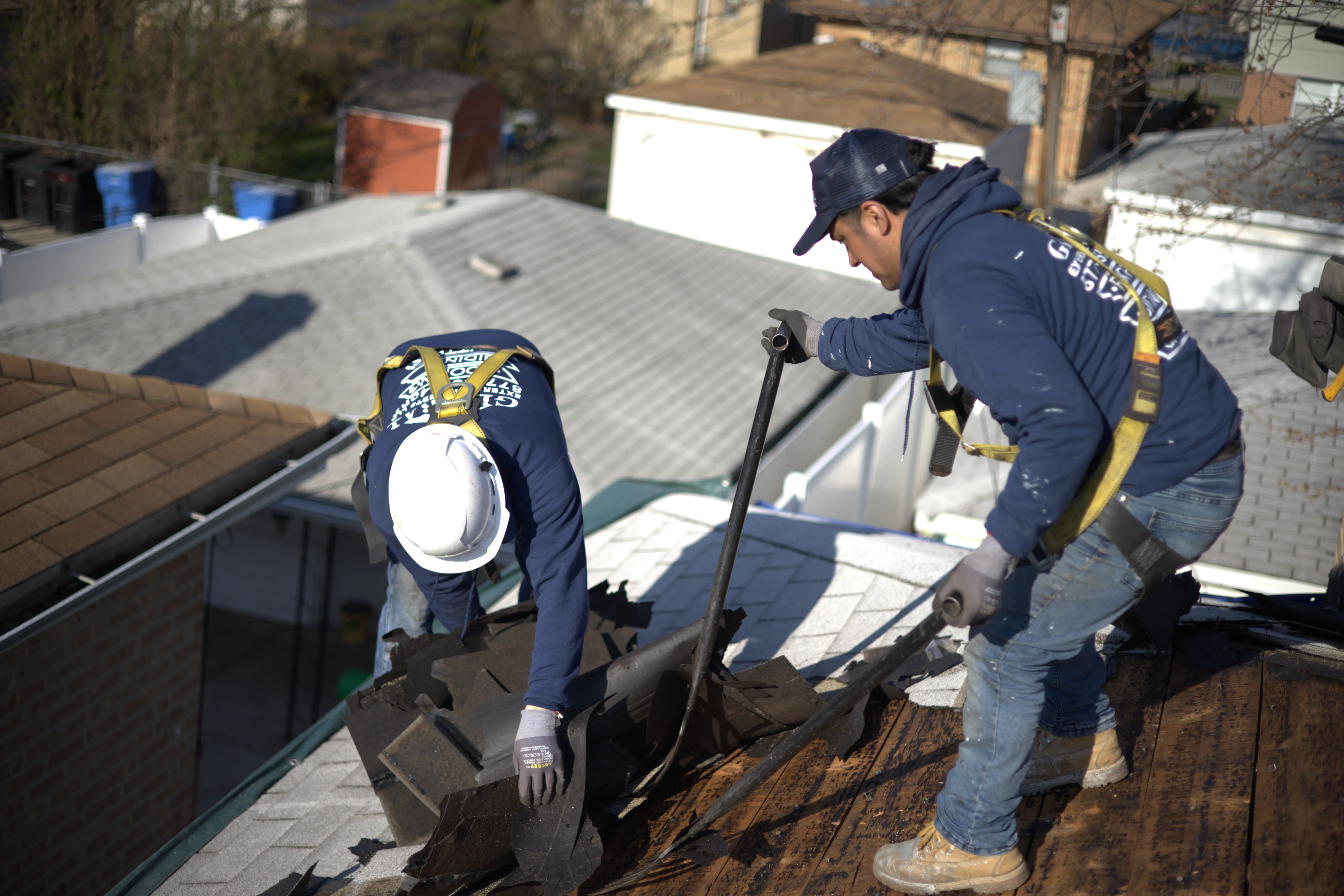 Roofers Tearing Off Roof
