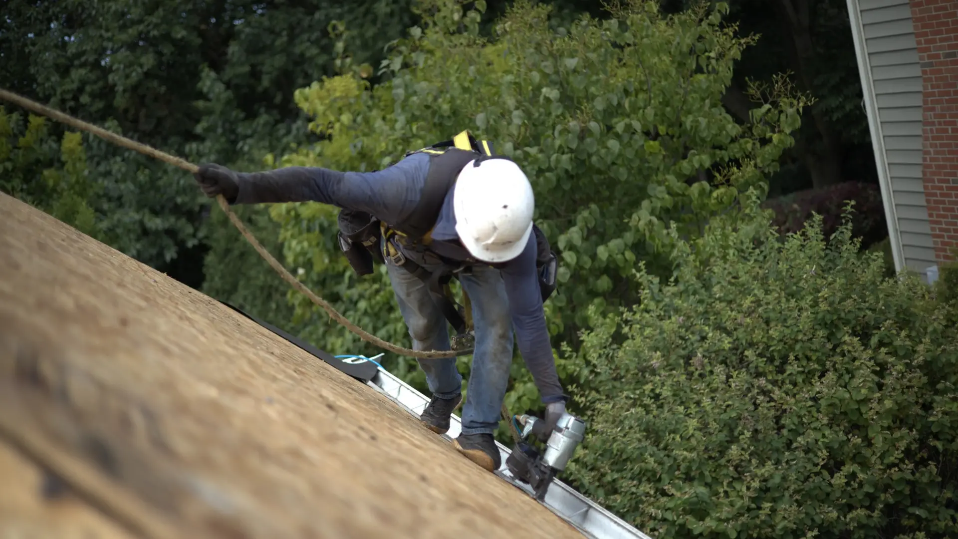 Professional Residential Roofer Installing Drip Edge On