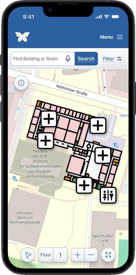 Screenshot von "a11y maps" auf einem Smartphone. Die App zeigt eine Karte mit einem Gebäudeplan. Darauf sind mehrere Plus-Symbole und ein Toiletten-Symbol platziert. Unten gibt es Schaltflächen zum Zoomen und Wählen der Etage. Oben gibt es eine Suchleiste und eine Menüschaltfläche.