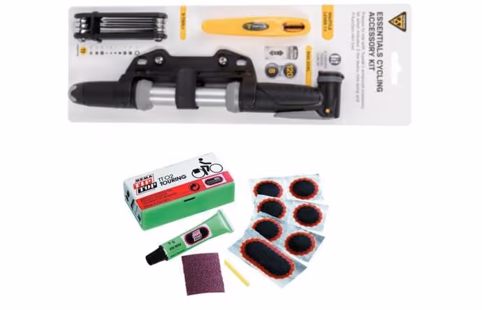 bicycle puncture repair kit laid out against white background