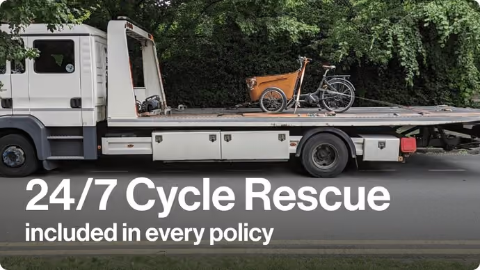 cargo e-bike being carried on the back of a large breakdown recovery lorry
