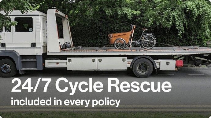 cargo e-bike being carried on the back of a large breakdown recovery lorry