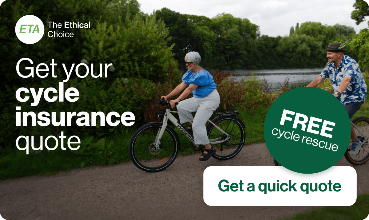 middleaged couple riding e-bikes in British countryside