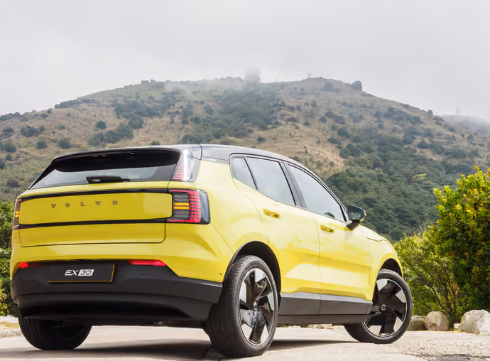 Volvo EX30 EV with rutal background
