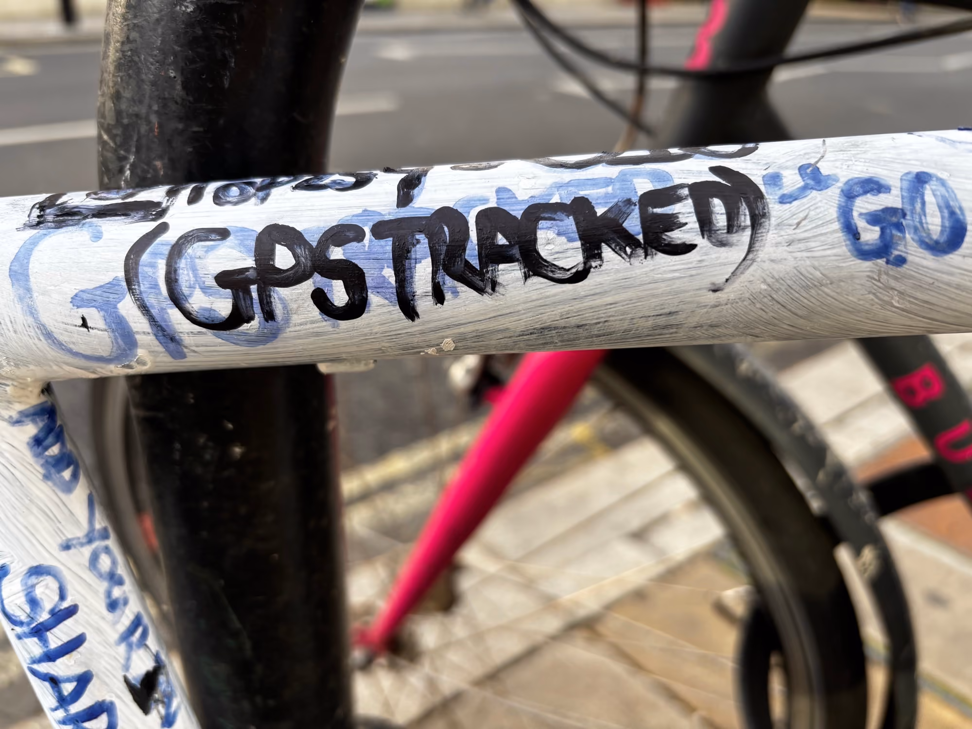 ratty bicycle at bike rack in London