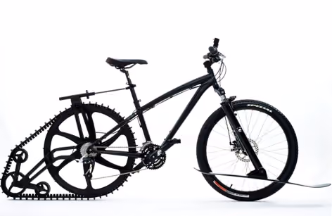 side view of the ETA's BOND bike – a custom creation featuring a caterpillar track, ejector seat and flamethrower
