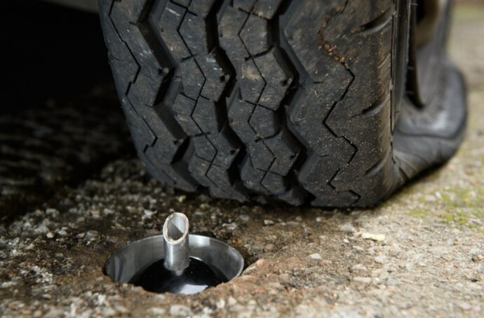 close-up f catclaw device and burst tyre