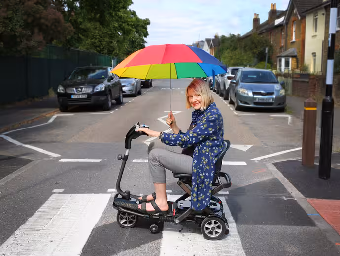 elderly woman on mobility scooter