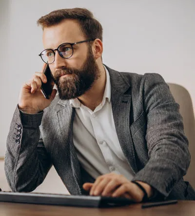 Salesperson making cold calls for a european sales outsourcing agency.
