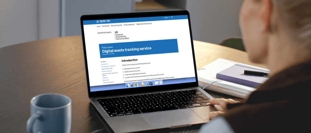 TEIMAS Woman reading about UK's Digital Waste Tracking System