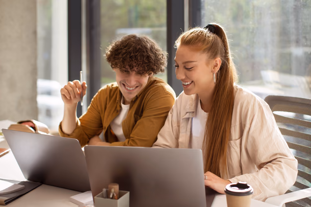 students on a laptop - Should Students Use AI