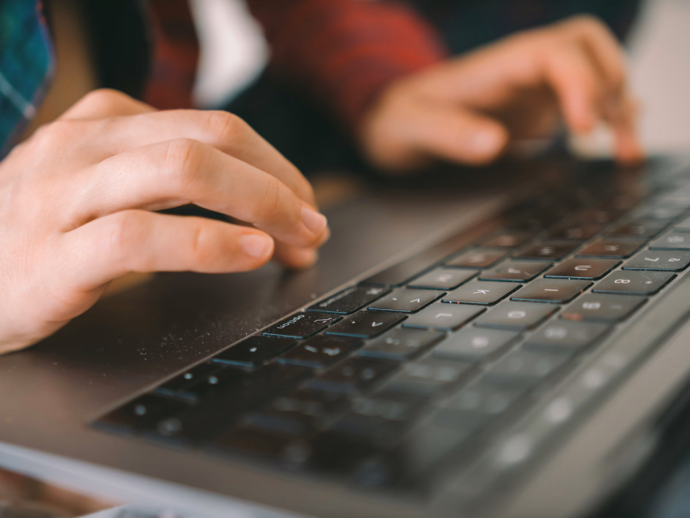 Person Typing on Laptop - Essay Writing Tips for Students