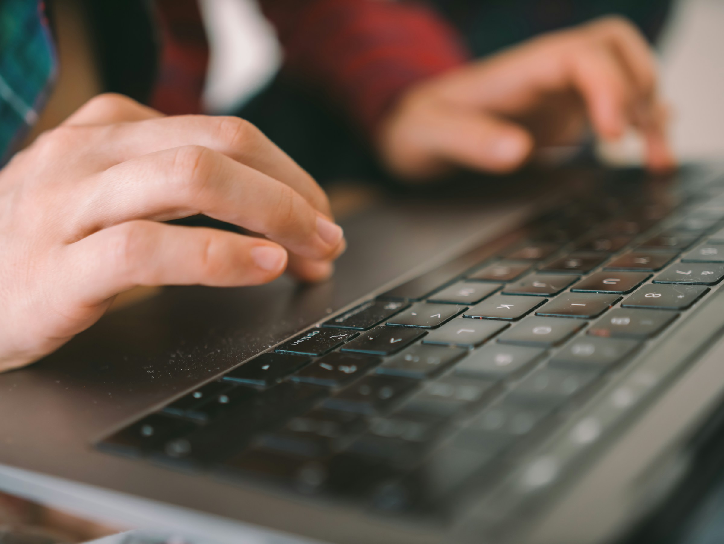Person Typing on Laptop - Essay Writing Tips for Students