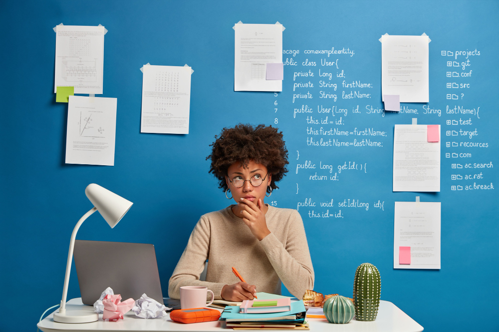 woman thinking - How To Write The Best College Essay