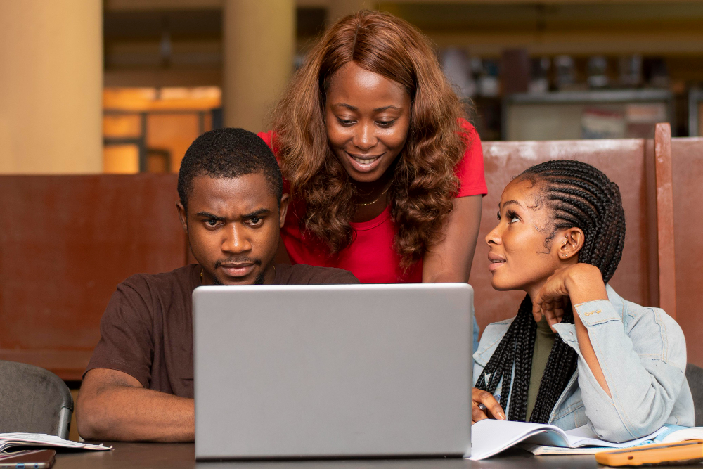 students on a laptop - Benefits of AI for Students