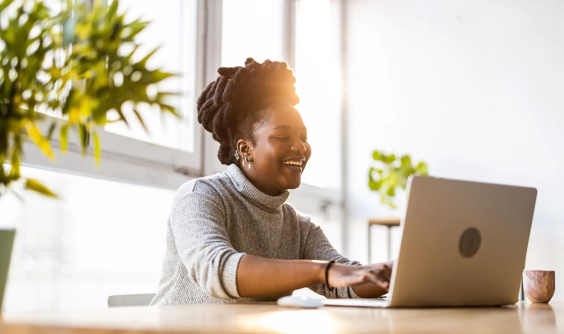 Employee looking happy - How to Be Organized at Work