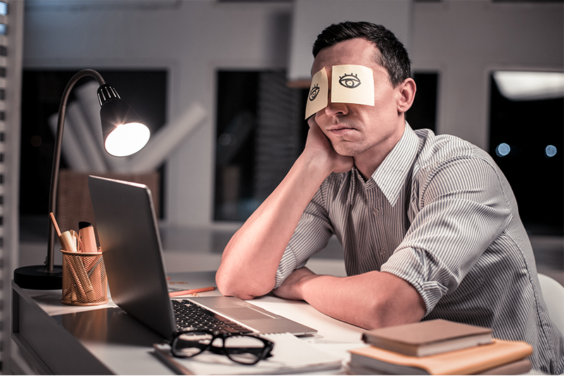 man sleeping sitting up - How to Stay Focused at Work