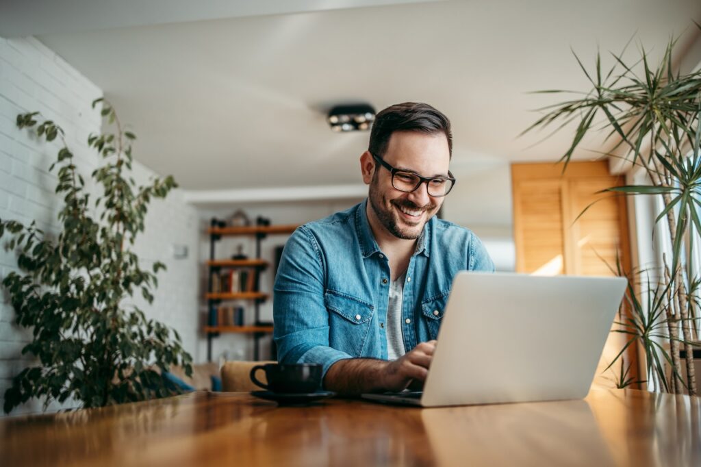 man in a blue shirt - Pros and Cons of AI in Marketing
