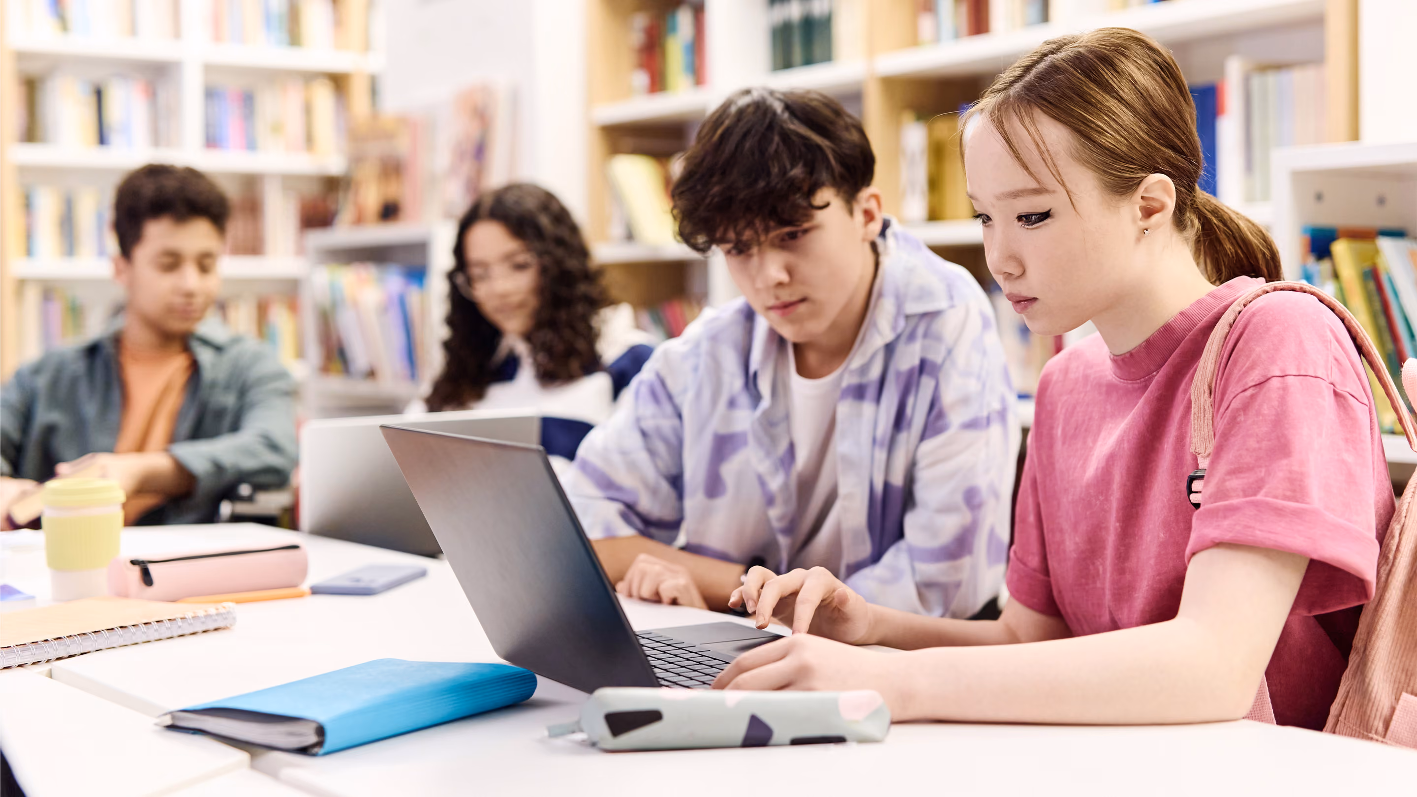 students in a library - Study Strategies for High School Students