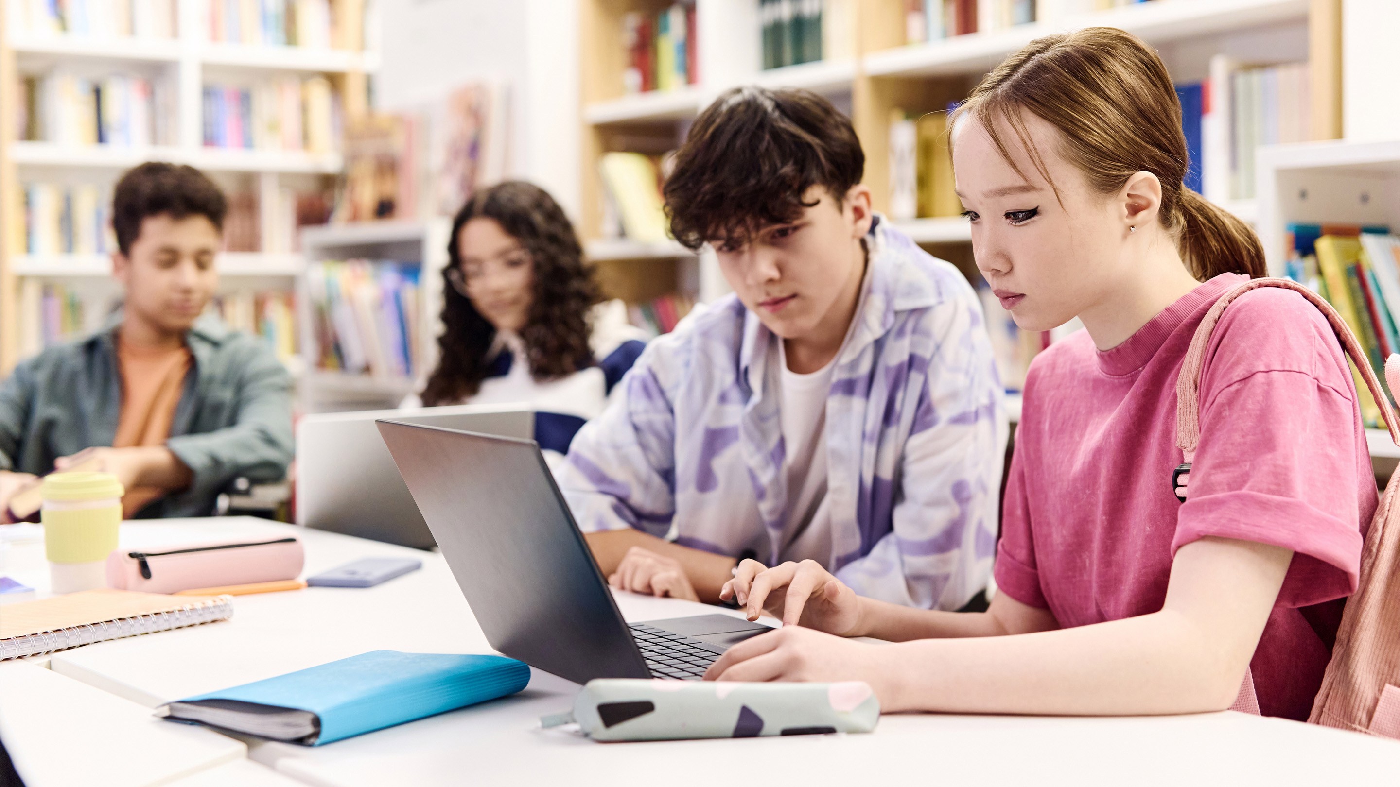 students in a library - Study Strategies for High School Students