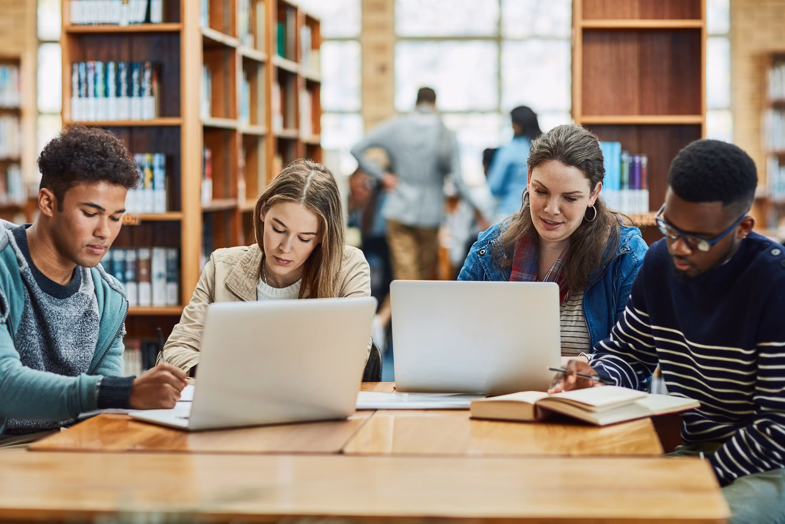 students in a library - How Many Hours Do College Students Study per Week