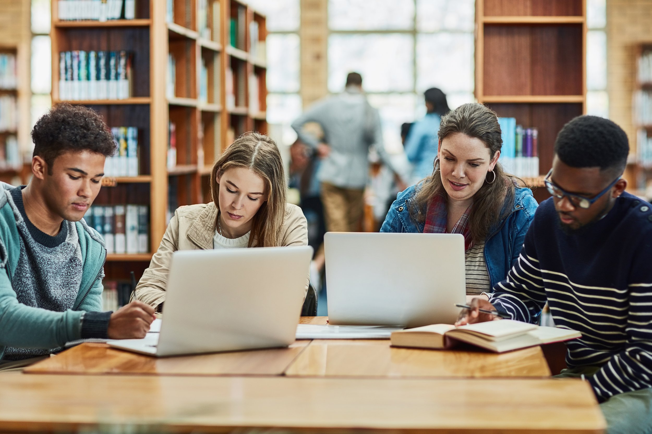 students in a library - How Many Hours Do College Students Study per Week