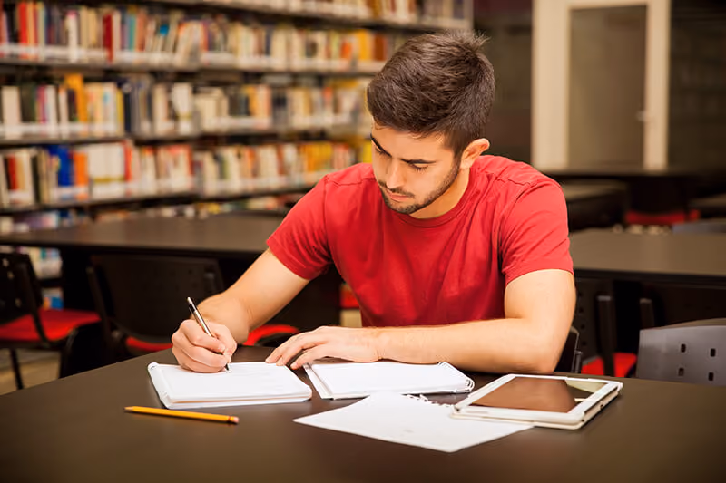 a student studying - Study Habits for High School