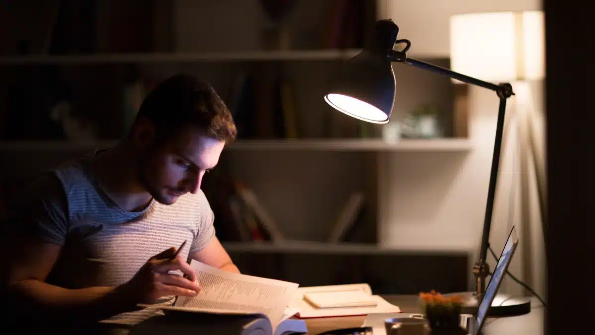 man reading - Best Light Color for Studying