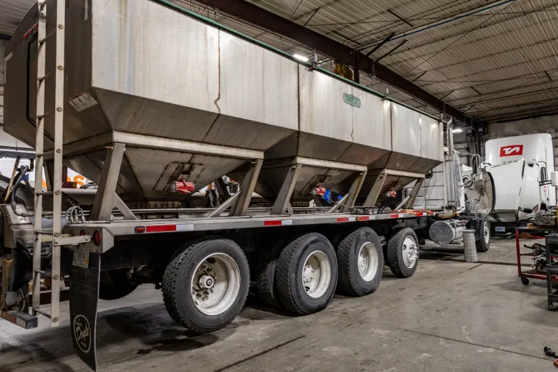 Mechanic repairing farming agricultural equipment in Janesville, WI