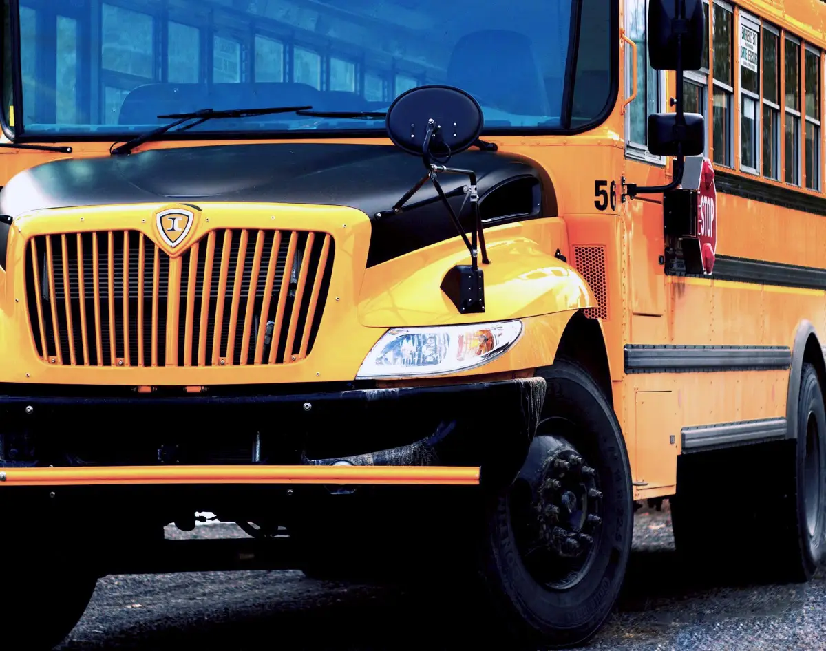Mechanic performing bus repair in Janesville, WI
