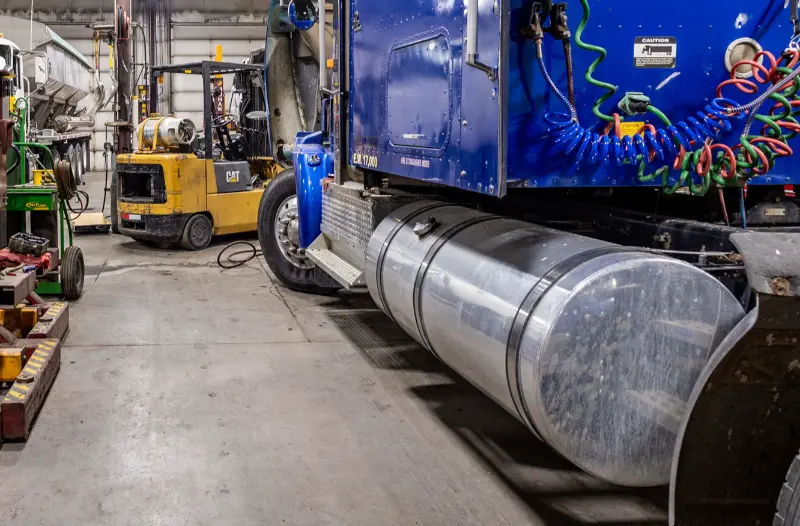 Mechanic performing Carbon B Gone DPF cleaning in Janesville, WI