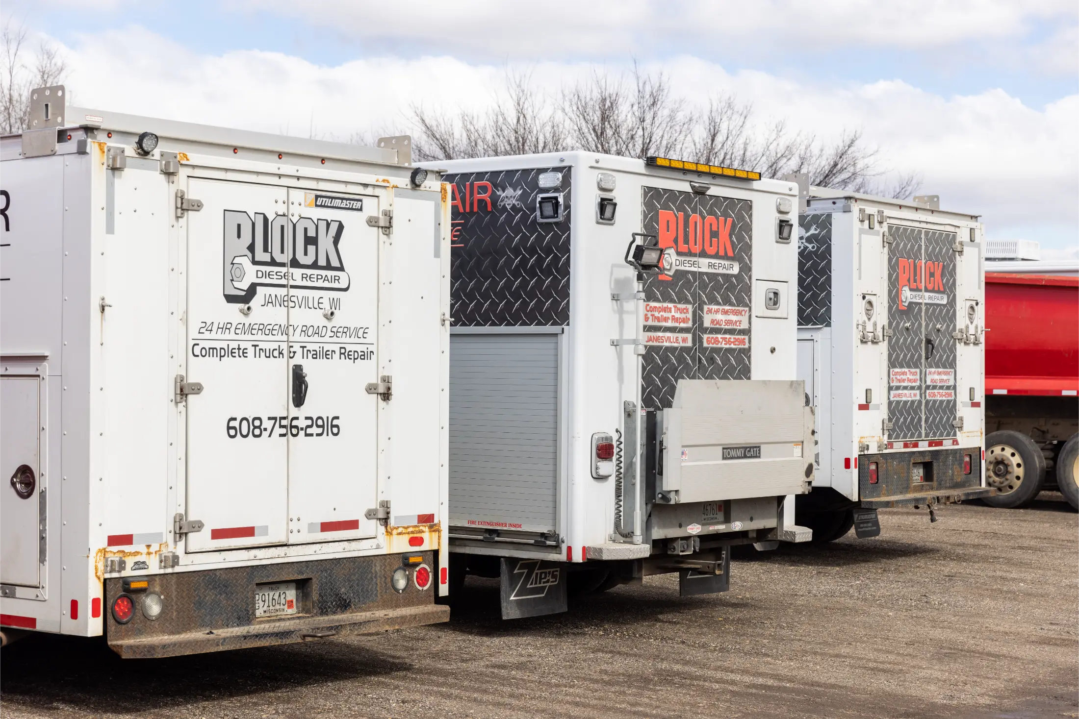 Diesel mechanic performing emergency roadside assistance in Janesville, WI