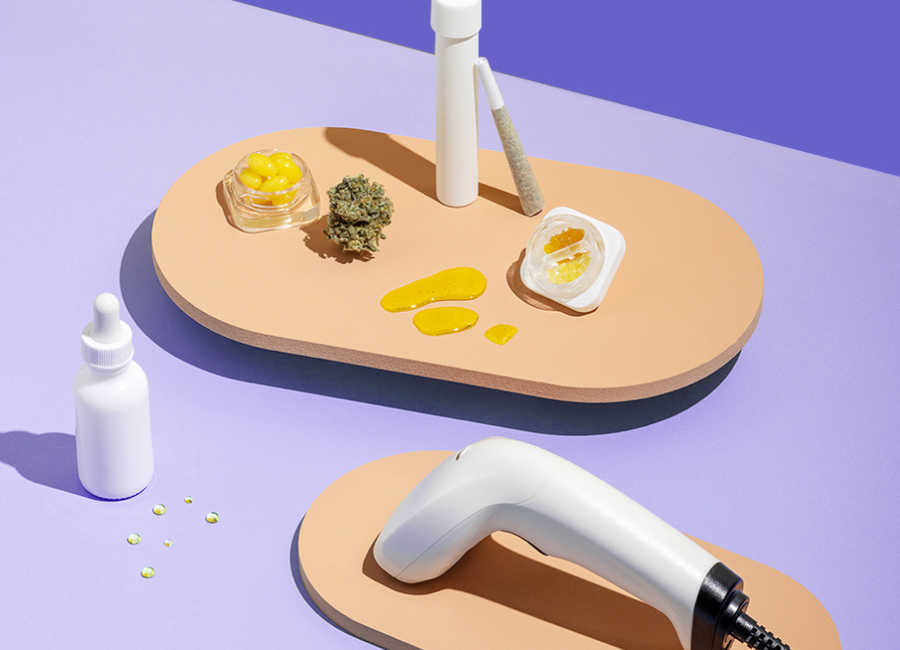 Cannabis products arranged on a purple background