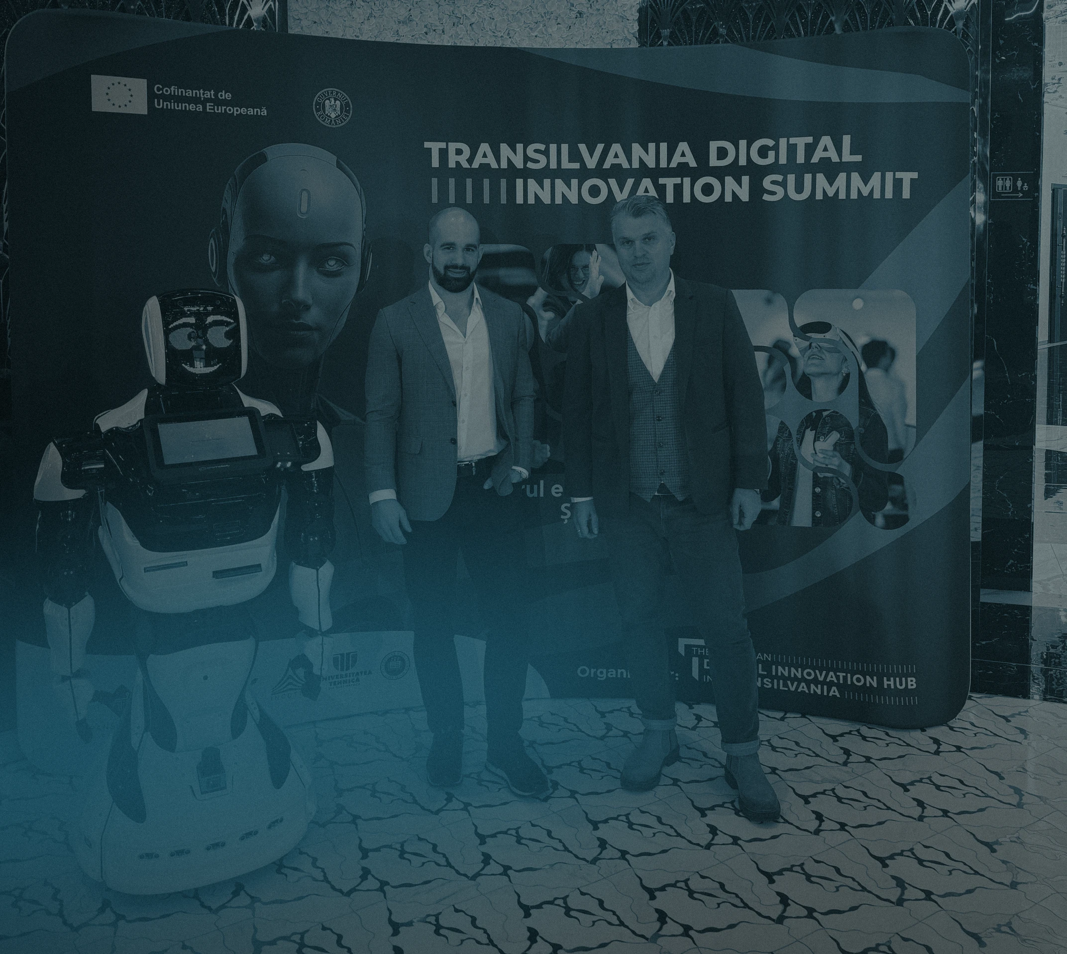 Speakers in front of the Transilvania Digital Innovation Summit backdrop