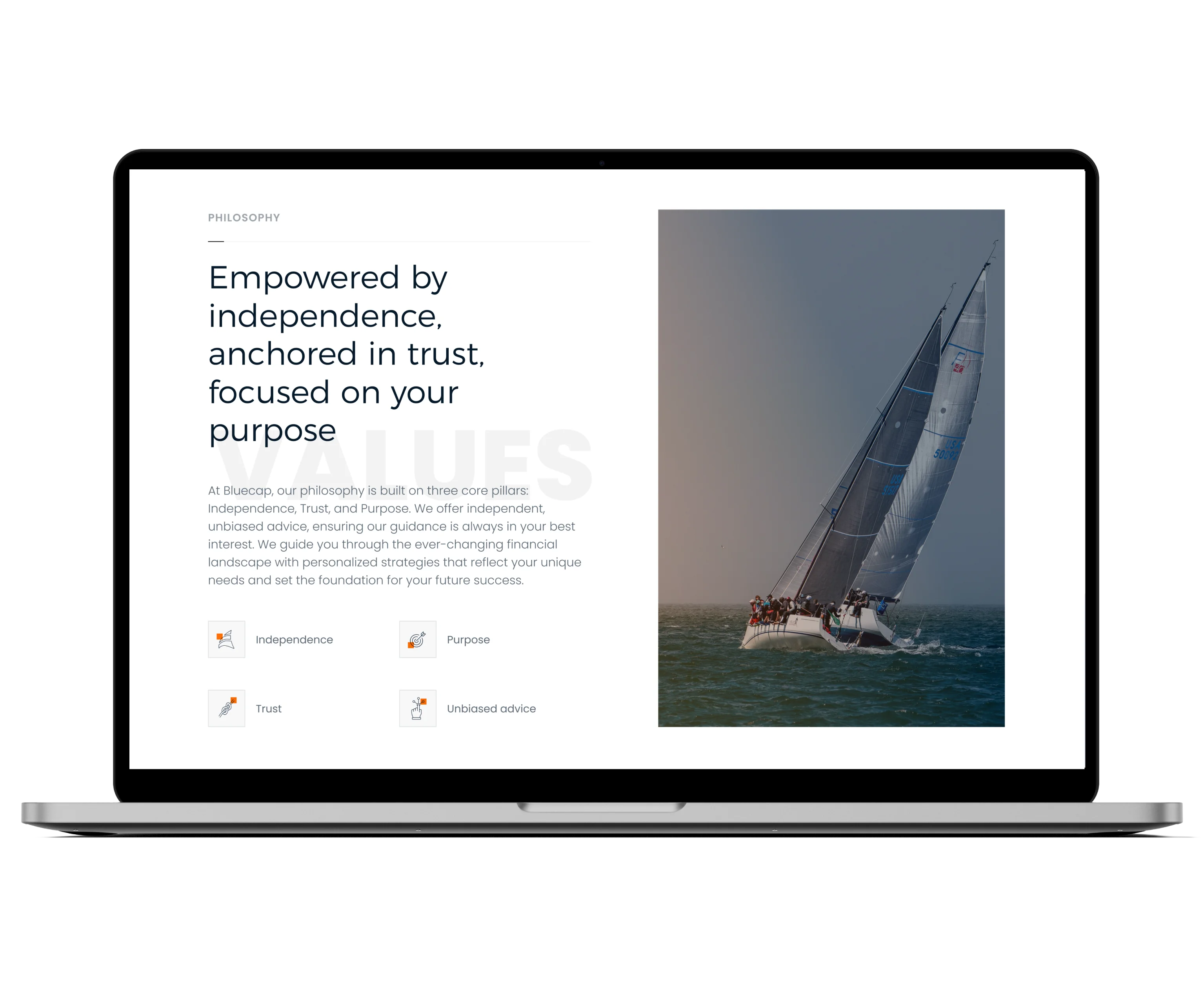 Bluecap website with a sailing boat photo shown on a laptop