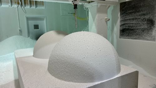 Two CNC milled domes