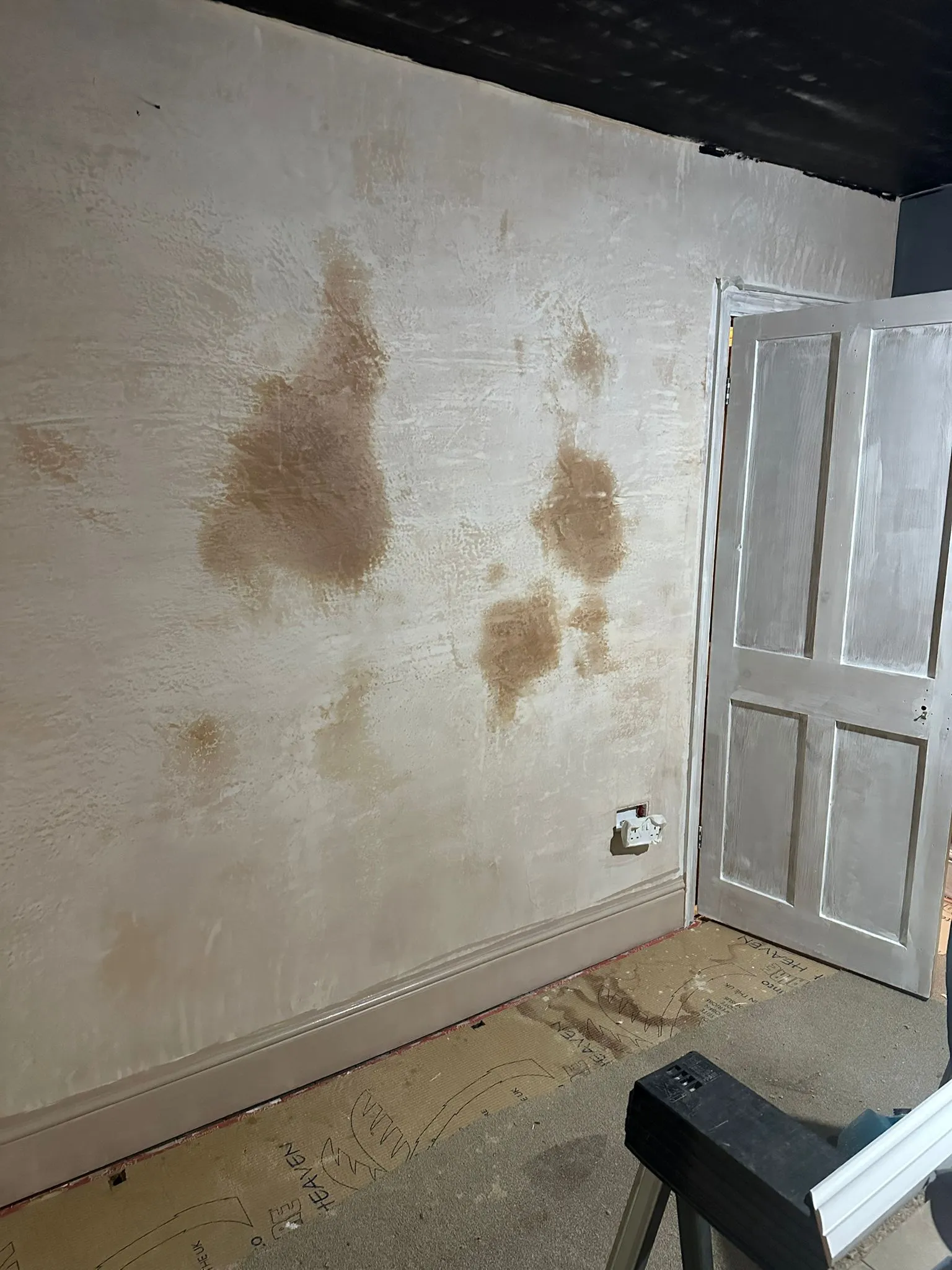 garage walls being plastered