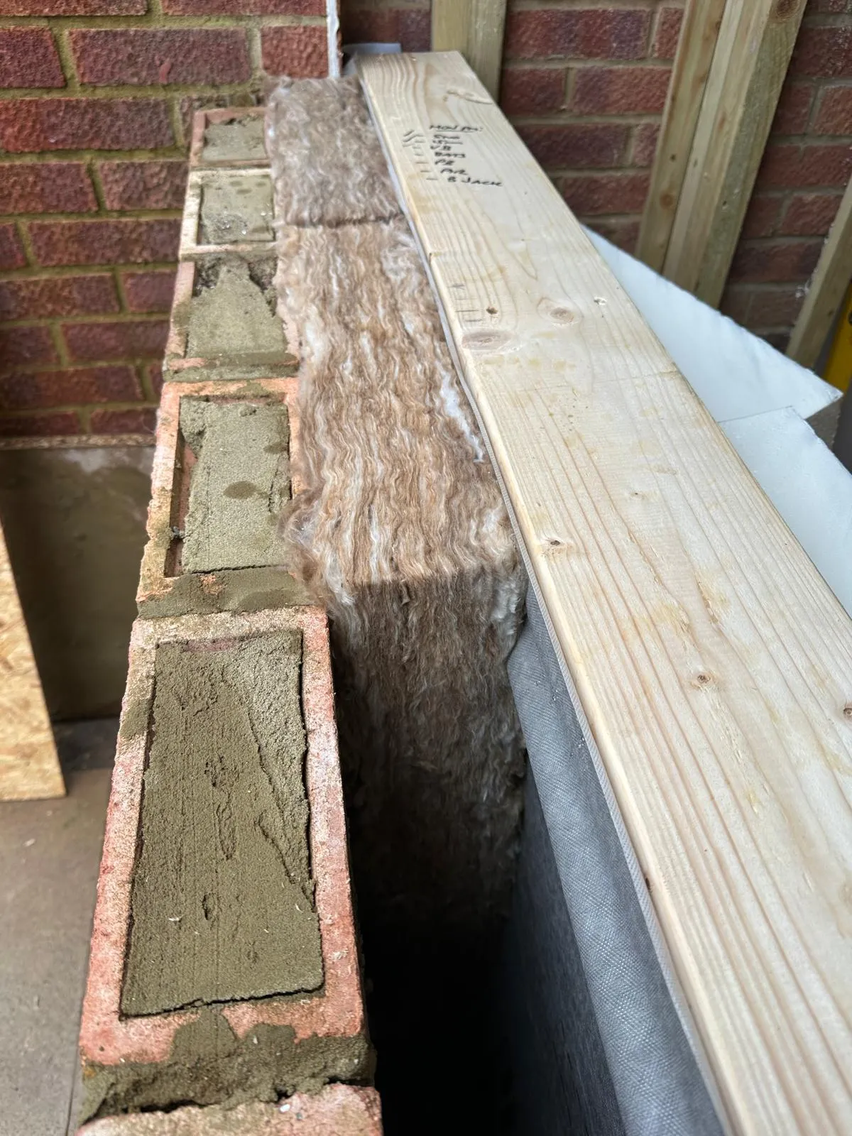 garage walls being plaster boarded