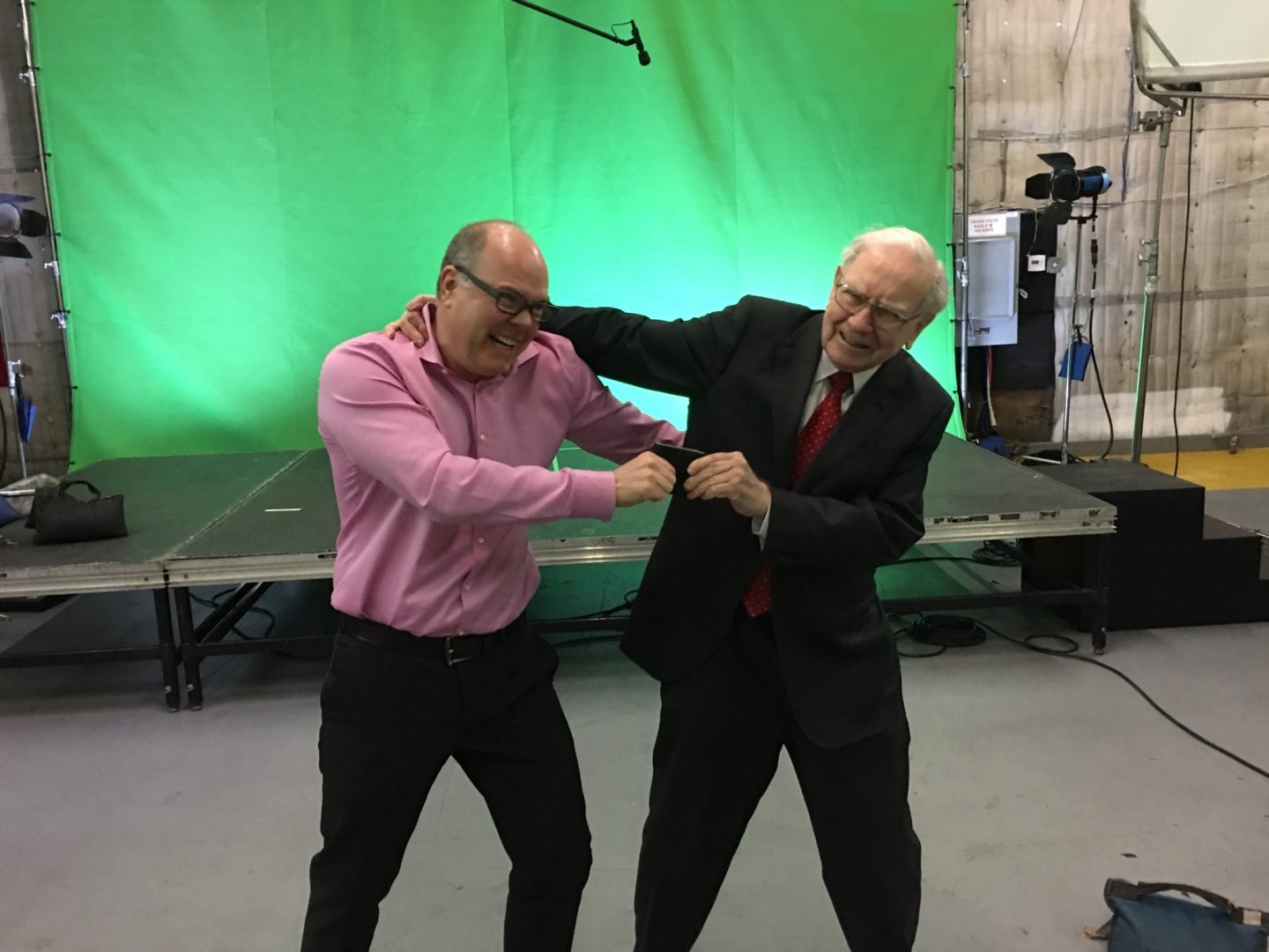 Paul Duffy and Warren Buffett on set
