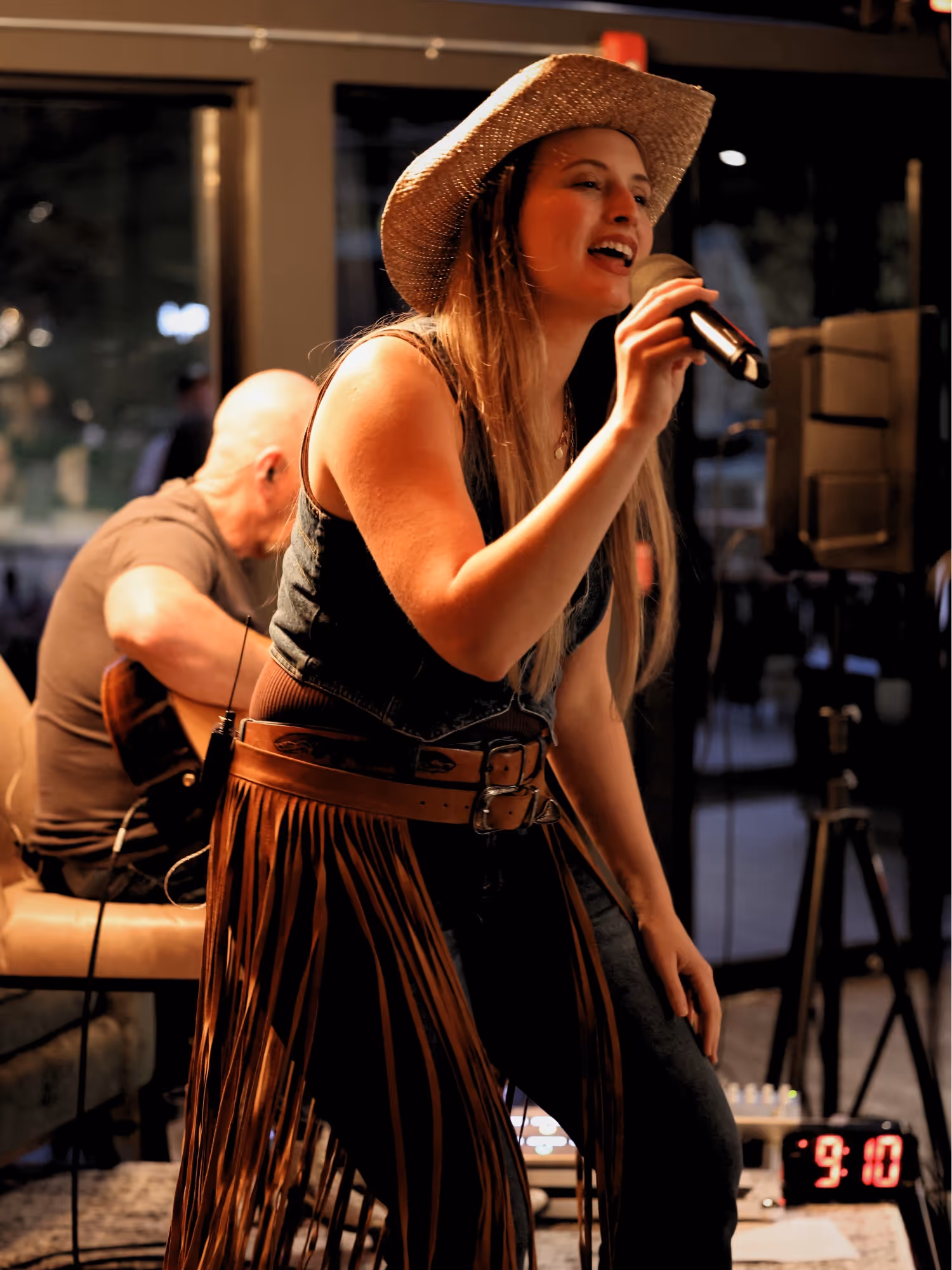 Musicians on stage in dark room